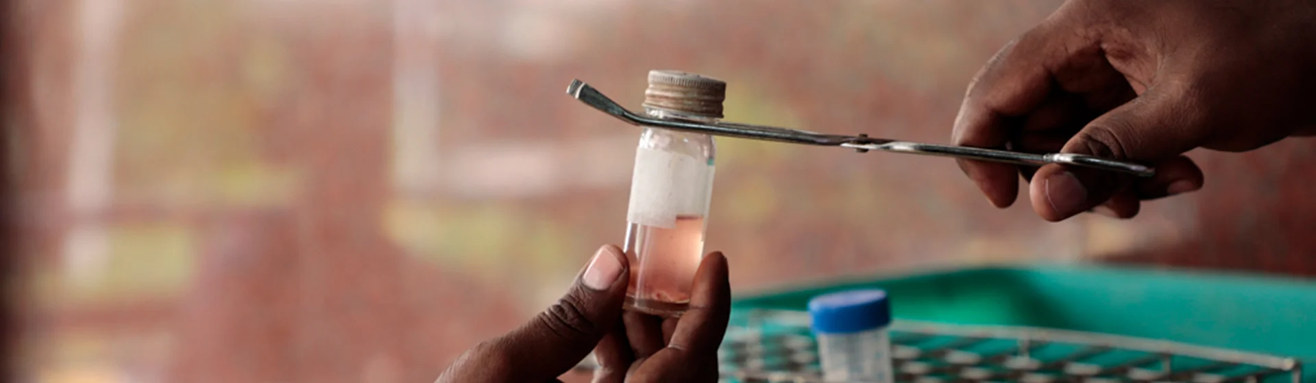 Healthcare worker holding a medicine